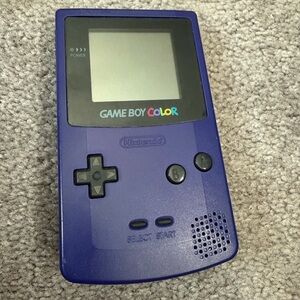 Nintendo GAME BOY Color 1998 model. Includes Super Mario Bros. Deluxe game.